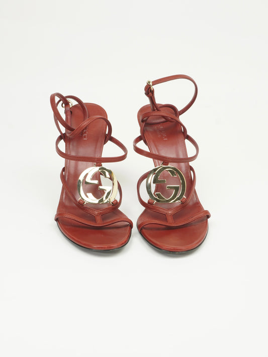 GUCCI RED LEATHER INTERLOCKING G STRAPPY HEELS