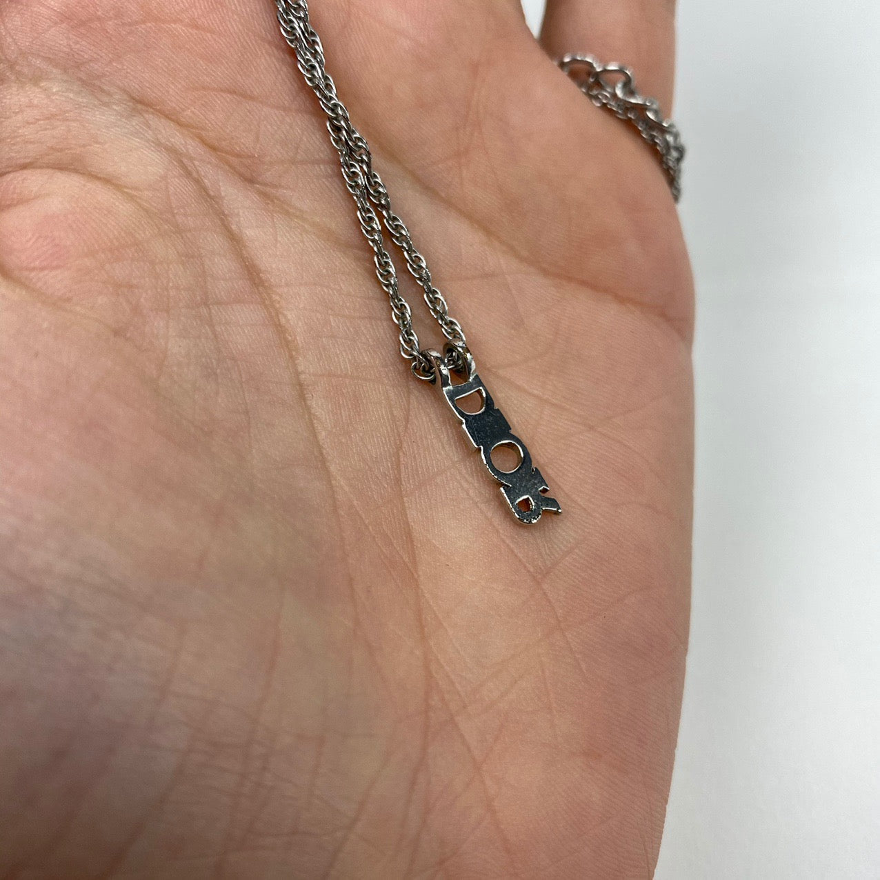 CHRISTIAN DIOR SPELL-OUT NECKLACE