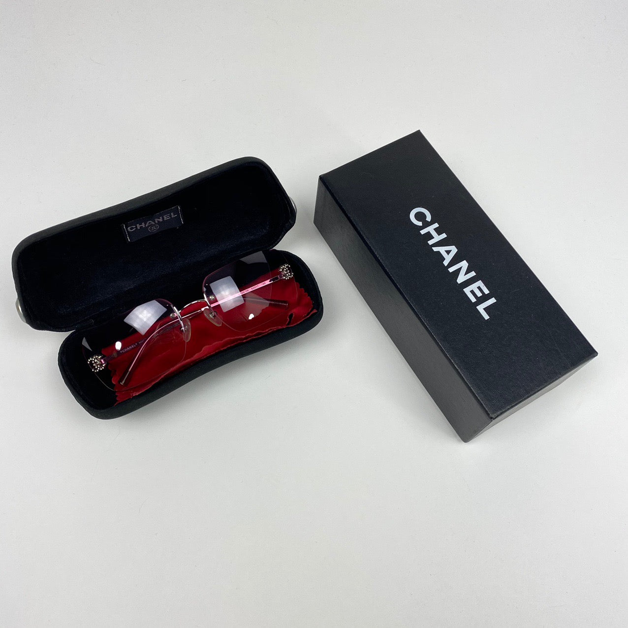 CHANEL PINK GRADIENT RIMLESS SUNGLASSES