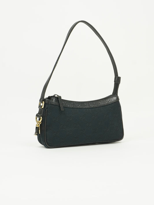 GUCCI MONOGRAM BOOT CHARM BAG