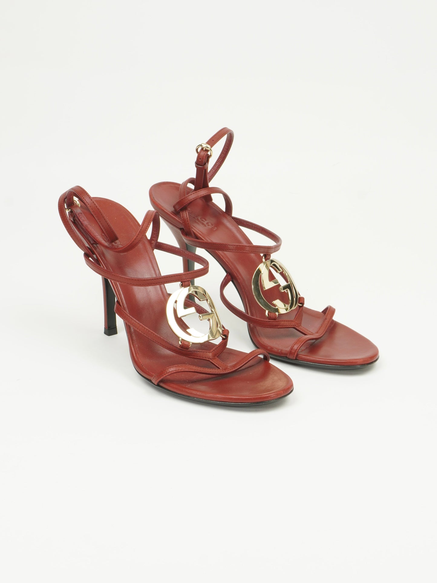 GUCCI RED LEATHER INTERLOCKING G STRAPPY HEELS
