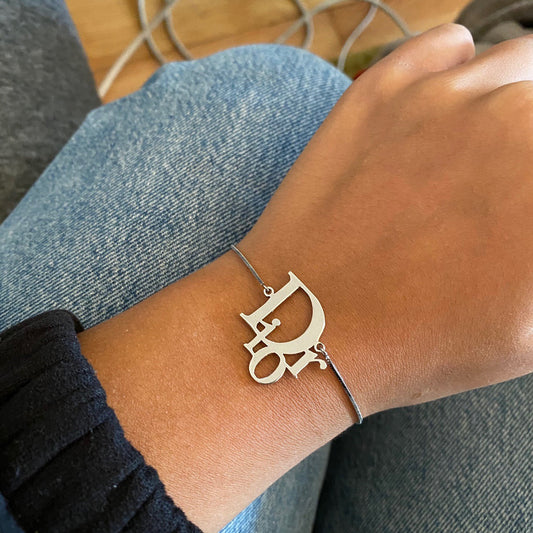 CHRISTIAN DIOR MONOGRAM LOGO BRACELET