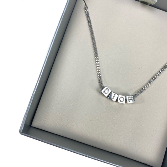 CHRISTIAN DIOR SPELL-OUT NECKLACE